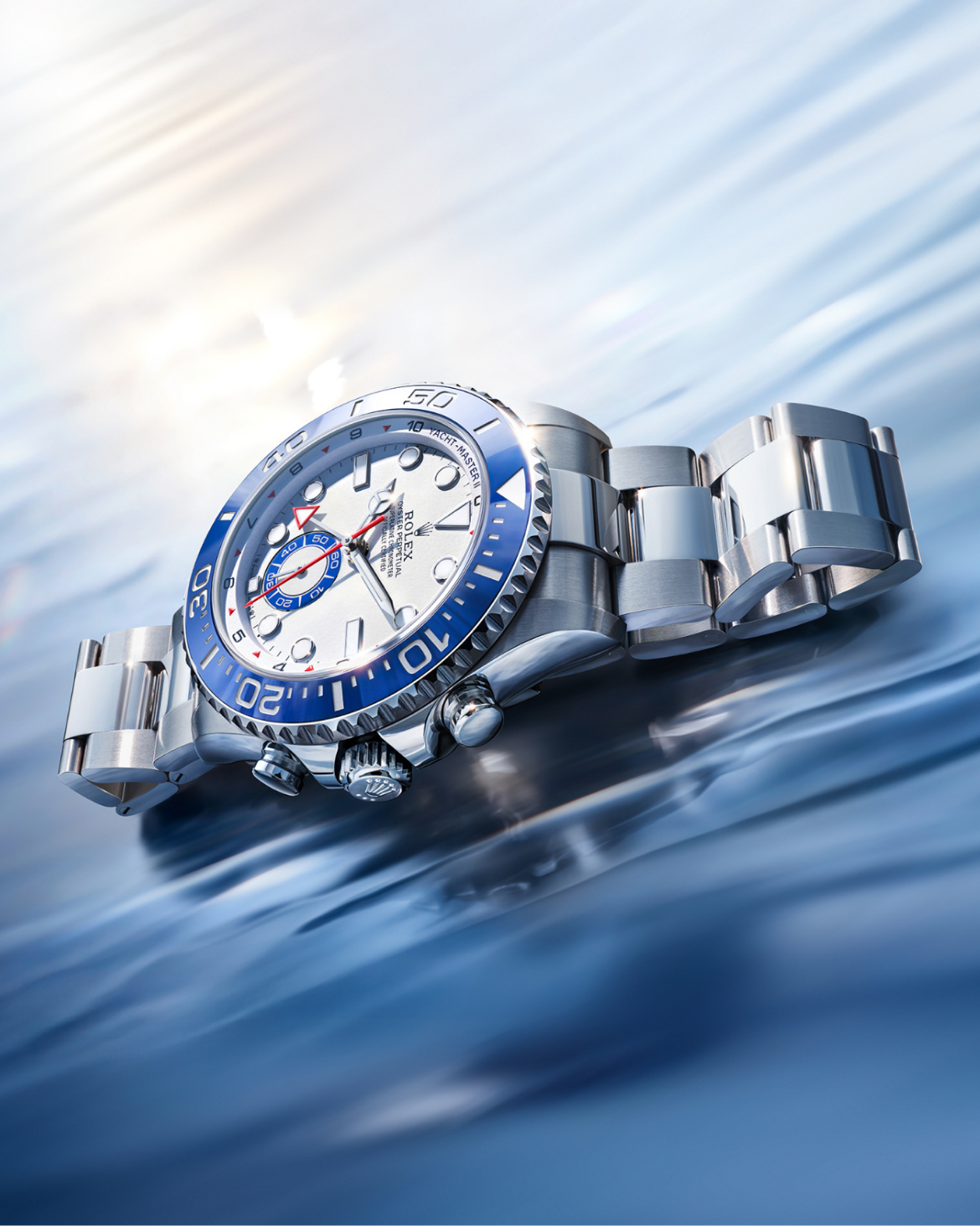 Stainless steel wristwatch with a black dial, rotating bezel, and silver hour markers. The watch has a polished metal bracelet and displays the time in a well-lit environment.